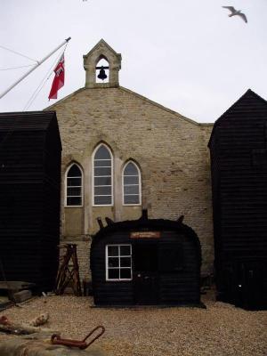 Church attached to wooden netshops