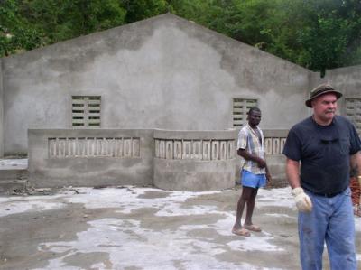 inside the church with no roof, paint or benches