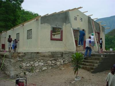 one coat of paint almost on the church (Monday evening)