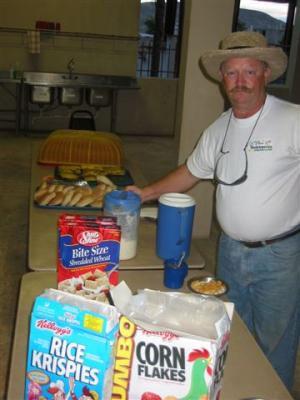 Jerry with Tue morning breakfast  (cereal with shelf milk)