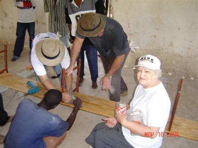 Elizabeth supervising the bench making