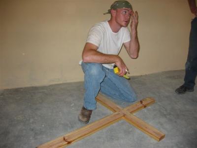 Matt working on the cross to hang at the front of the church