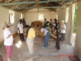 inside an old building (used as a school and church) building benches