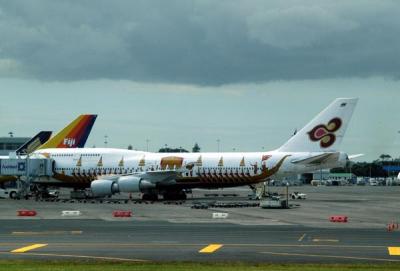 Thai Airways 747 with royal barge in Auckland