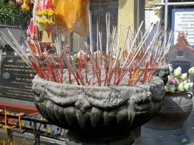 Jogsticks offerings in front of Khruba Sriwichai stastue