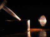 Flashlight blows out candlelight*