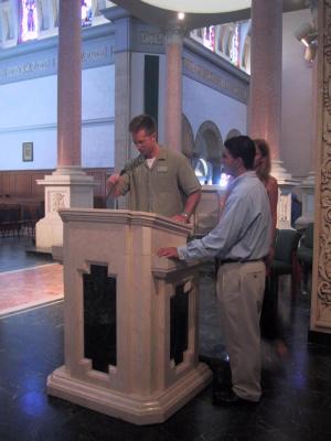 Tom and some guy practicing the homily.jpg