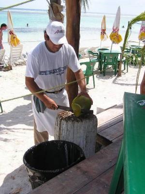 chopping coconut in Costa Maya.JPG