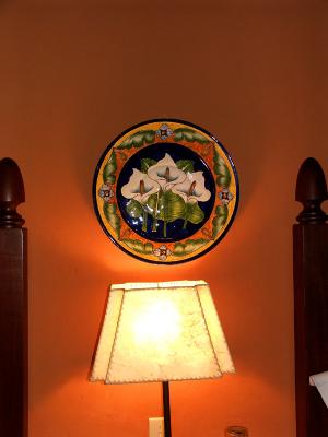 Hand painted plate in bedroom