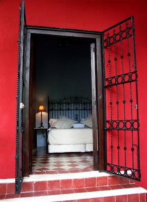 Bedroom opens to patio and swimming pool