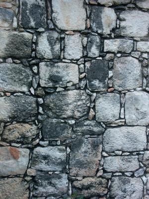 Int'l treaties require small stones be place in area of restoration not originally intact