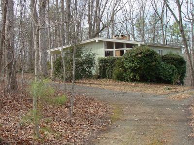Our home, looking down the driveway.