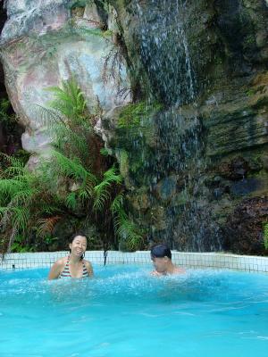 Hazel & Ming enjoying the pool's  waterfall