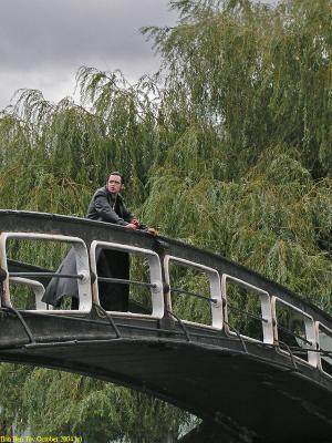 Man on a bridge in Camden Lock