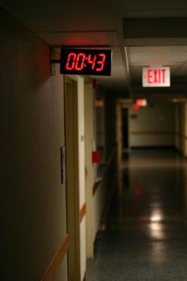clock by bathroom entry