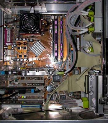 The PC70 is everntually sold off. In it's place I got a PC60-U. That's the Asus AX7N8X-Deluxe mobo