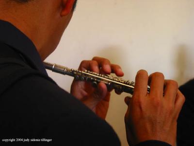 flute player, antigua, guatemala