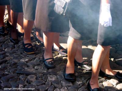 women's feet at the procesion, antigua, guatemala