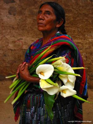 grandmother with callas, antigua, guatemala