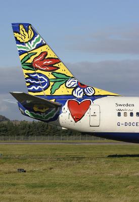 British Airways World Images tail scheme entitled Blomsterang or Flower Field, as worn by one of their Boeing 737-400s