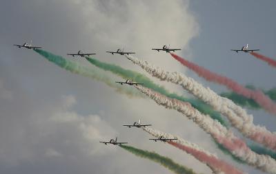The Frecce Tricolori smoke-up the early evening sky
