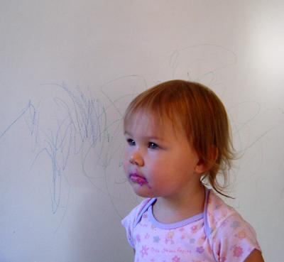 Reagan's first mug shot.  Notice the evidence of the crime behind her and on her mouth