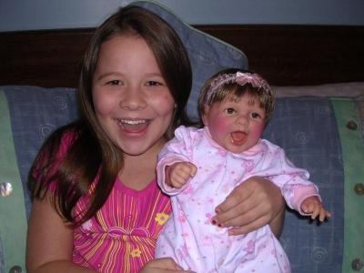 My daughter Marissa holding baby Marissa.jpg