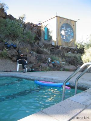 D. at the pool cube
