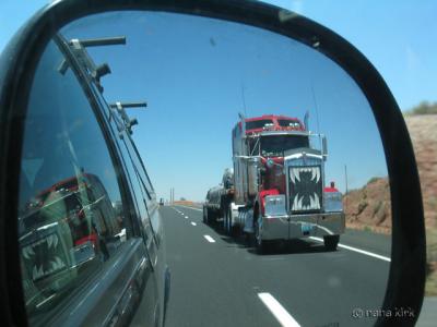 Objects in mirror are larger than they appear.