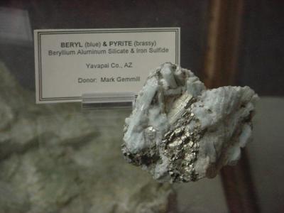 Beryl (blue)  Pyrite (brassy)