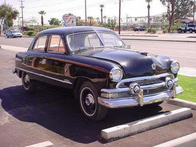 black 1951 Ford 4 door sedan