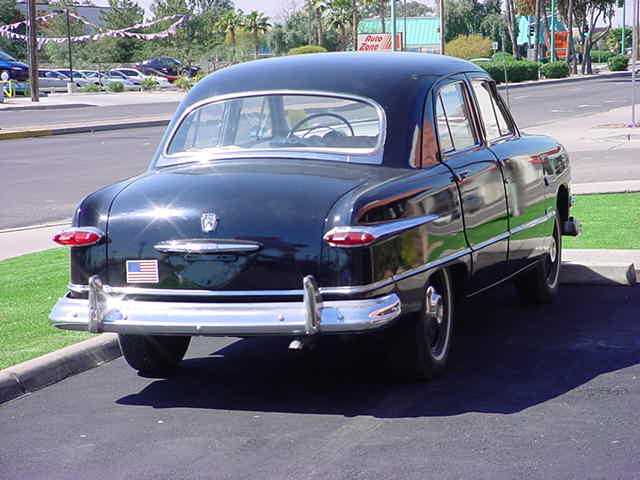 black 1951 Ford <br>4 door sedan