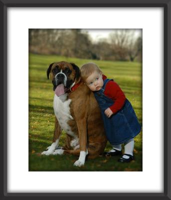 the Tidey family with Baron the Boxer Dog