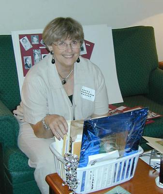 Anita Goodrich sorting pictures.