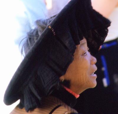 Chinese woman with traditional hat
