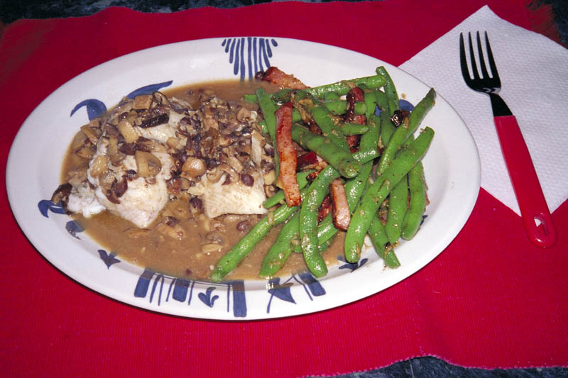 sea bass with wild mushroom sauce, beans with Canadian bacon and garlic