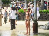 Washing off the sand at Waikiki