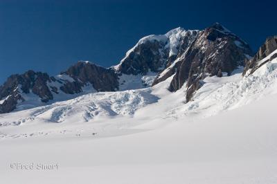 Fox Glacier with heli in distance