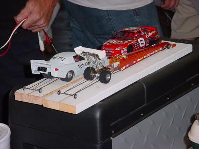 3 slot car racers