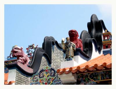 traditional Chinese temple architecture such as ceramic figures on roof ridges