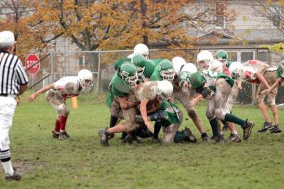 Gang tackling the RB for no gain