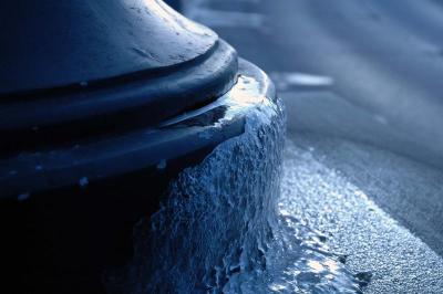 ice on streetlight base
