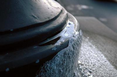 ice on streetlight base