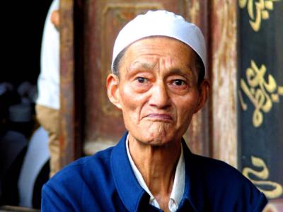 Old man at Friday prayers
