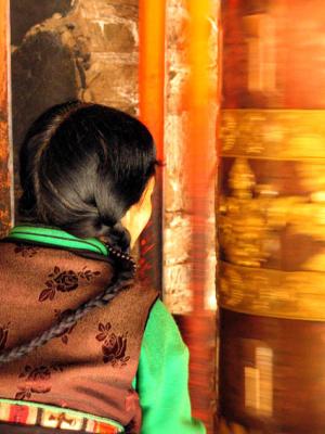 Devout Tibetan woman in Xiahe