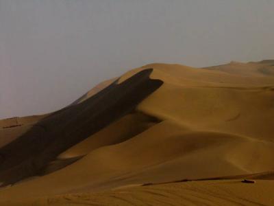 Sand dunes and dusty sky
