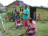 Visit to a local village, where they show us how to grind coconuts