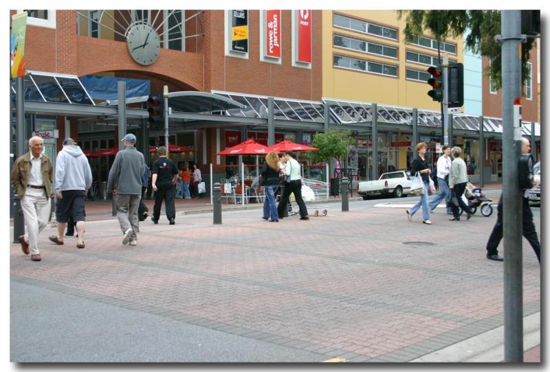 Shoppers on pedestrian xing