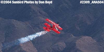 Sean Tucker and his Oracle Challenger at the 2004 Aviation Nation practice air show stock photo #2309
