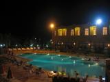 The hotel pool later that night